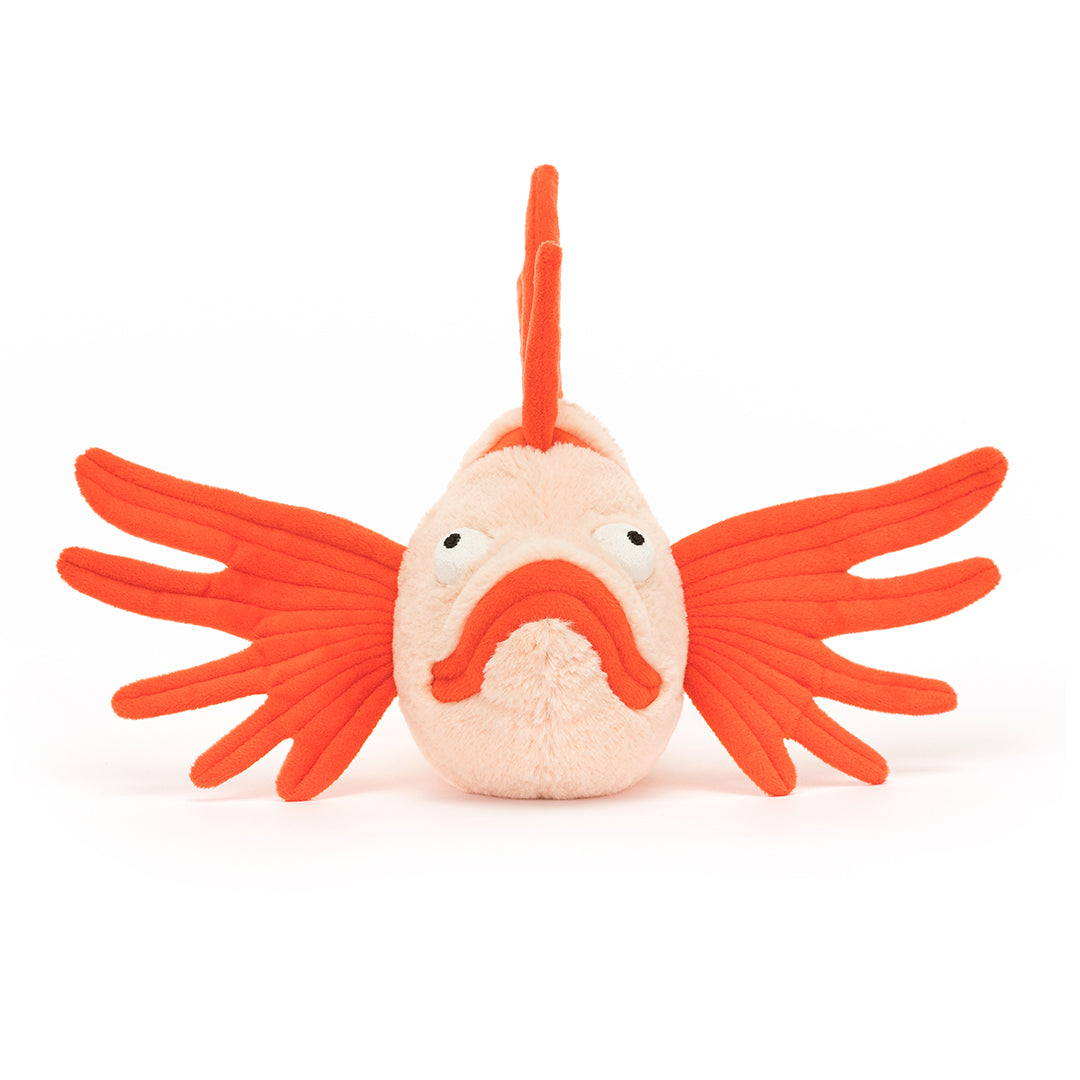 Stuffed orange fish toy.