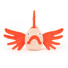 Stuffed orange fish toy.