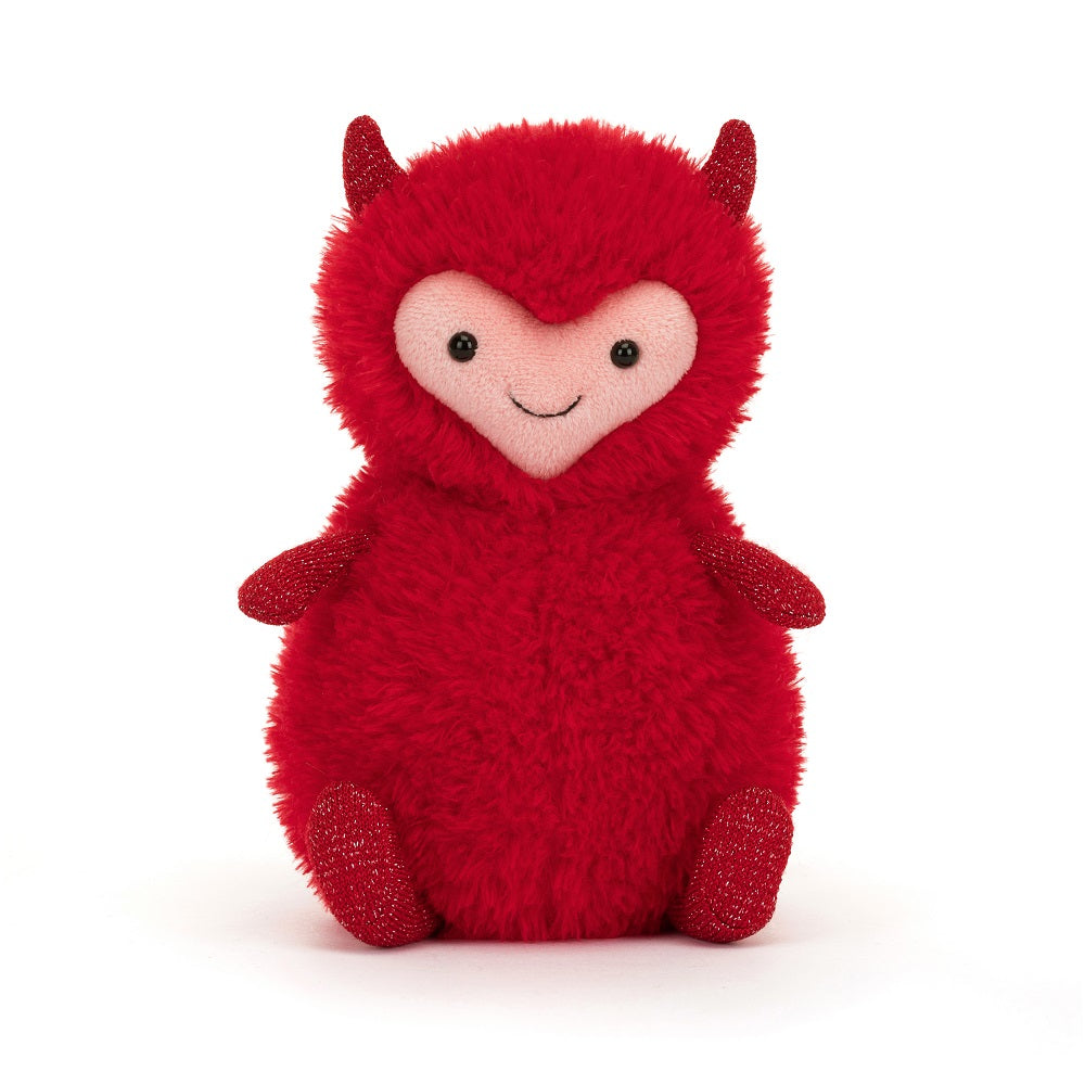 Red, fuzzy plush toy devil with heart-shaped face.