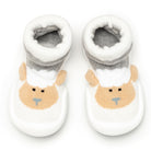 Two sheep-themed baby slipper socks.