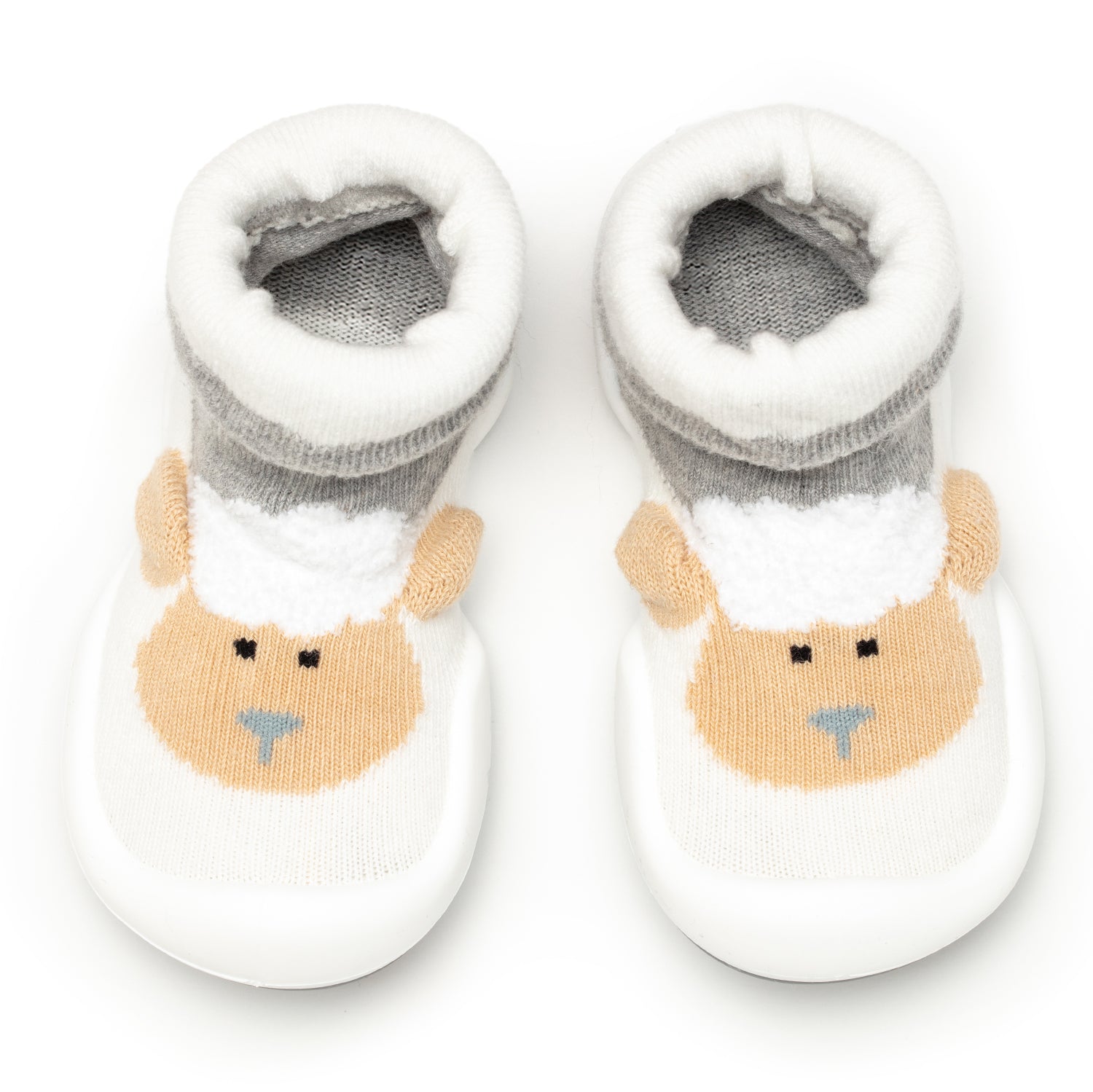 Two sheep-themed baby slipper socks.