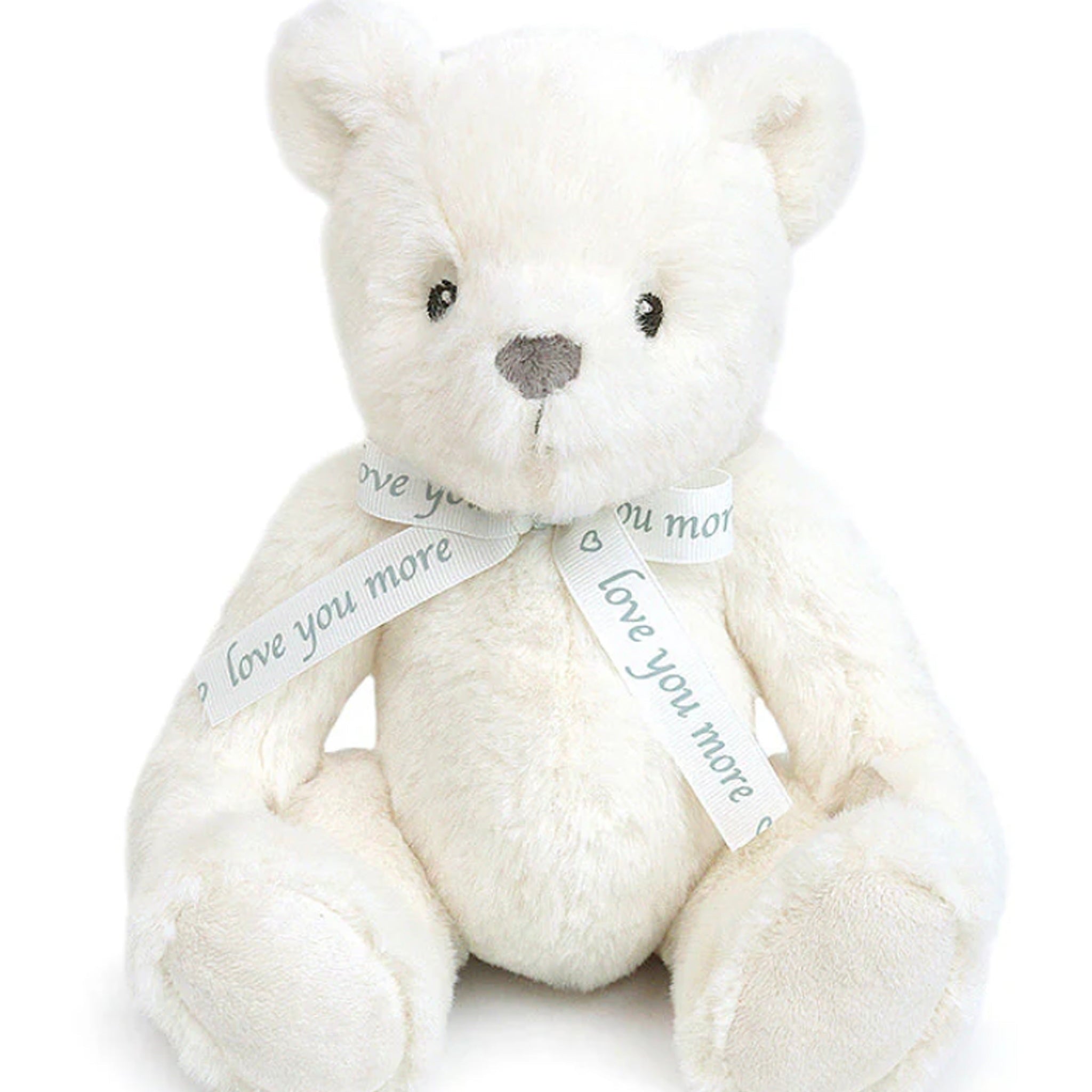 White teddy bear with a ribbon saying 'I love you more' on a white background