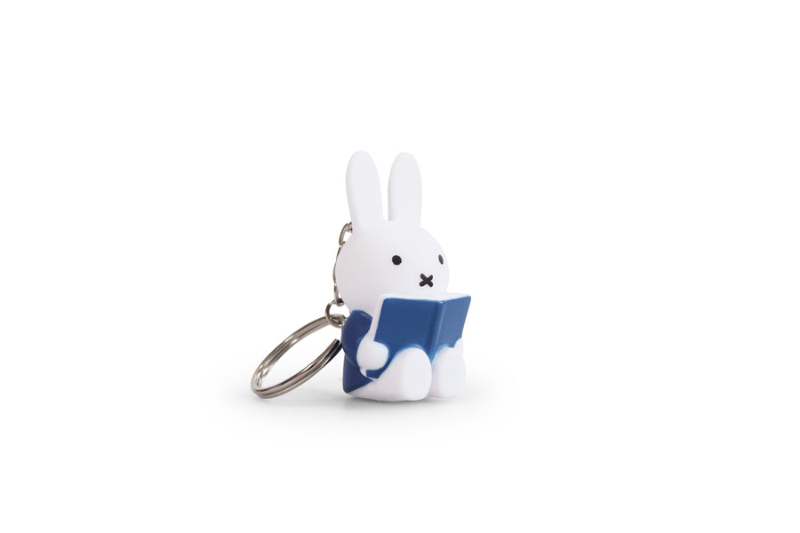 Miffy keychain with blue book.