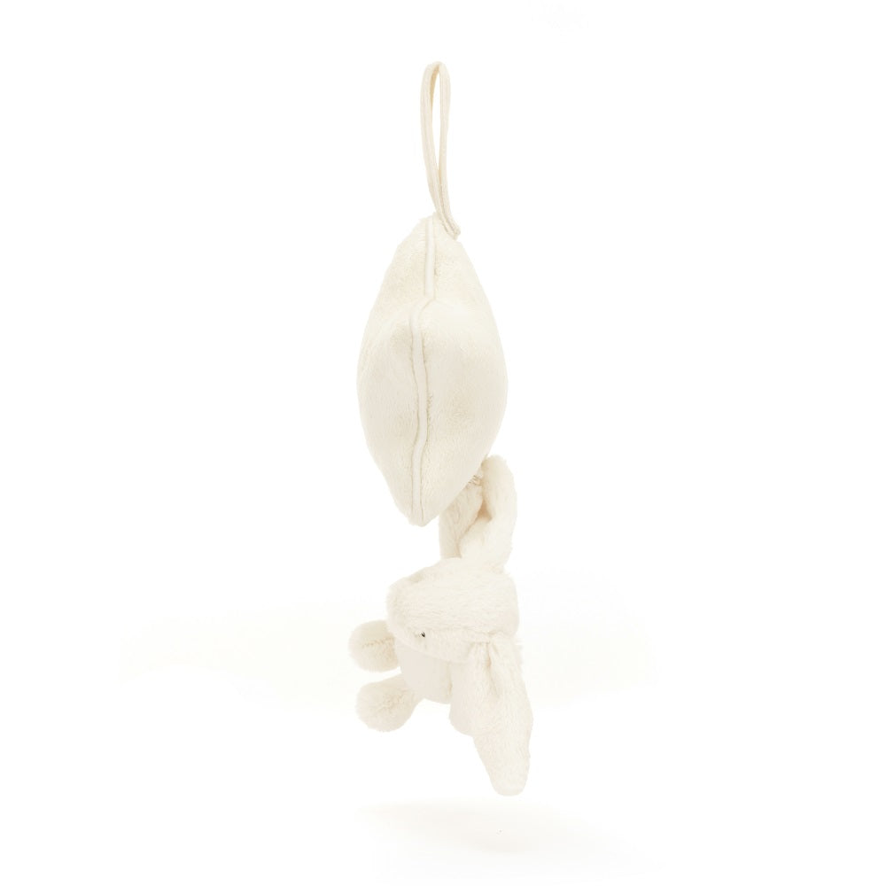 White plush star and bunny hanging toy.