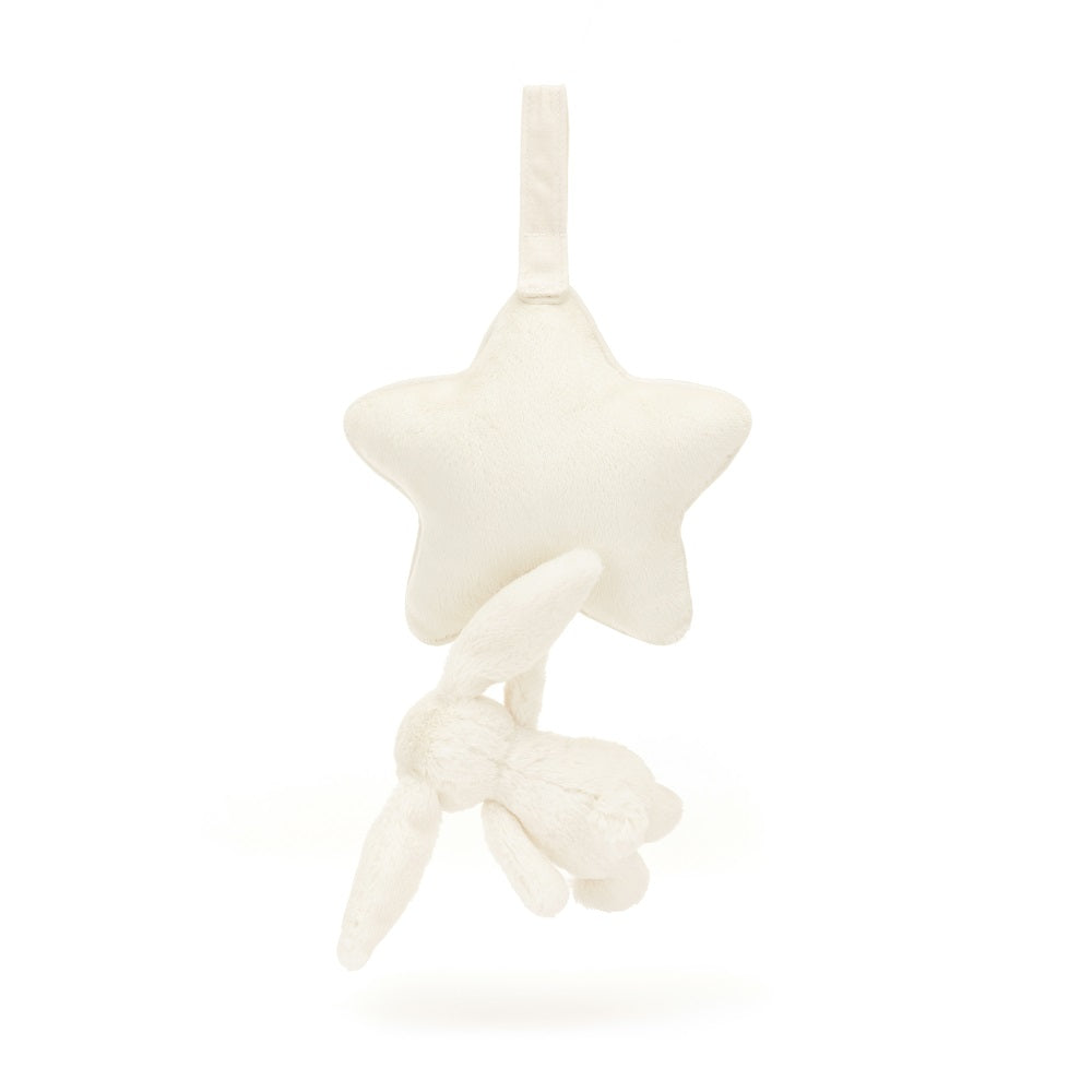 Cream-colored plush star and bunny baby toy.