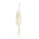 Cream-colored, plush lamb toy hanging.