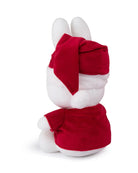 Back of white plush rabbit wearing a red Santa hat and red sweater.