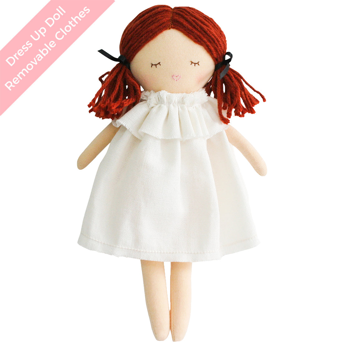 Ragdoll with red yarn hair in pigtails, wearing a white dress.