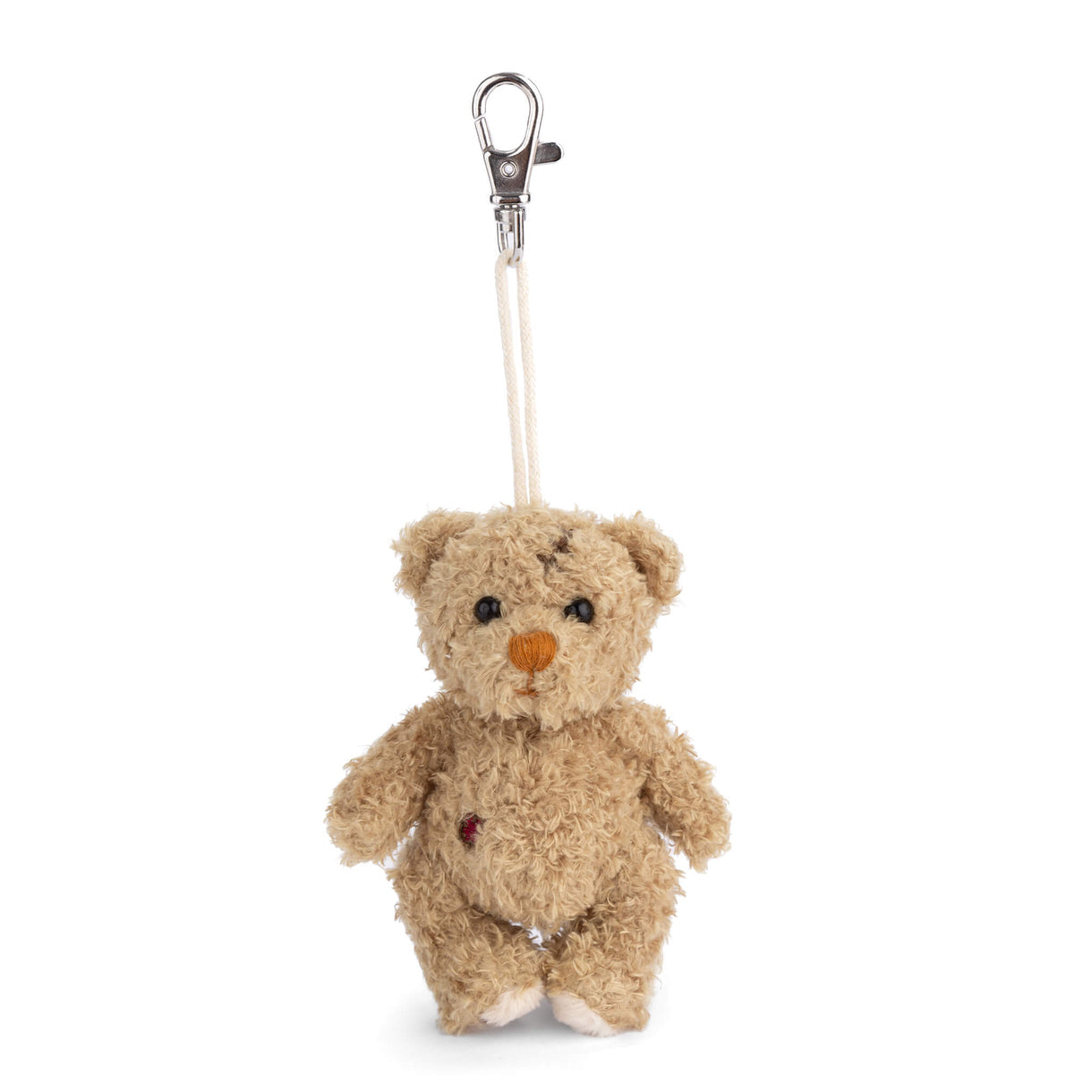 Small teddy bear keychain with a clip on a white background
