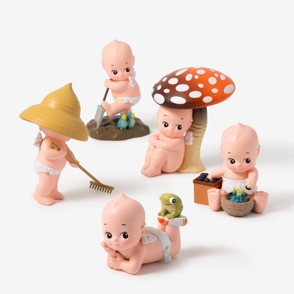 Set of small figurines on a white background