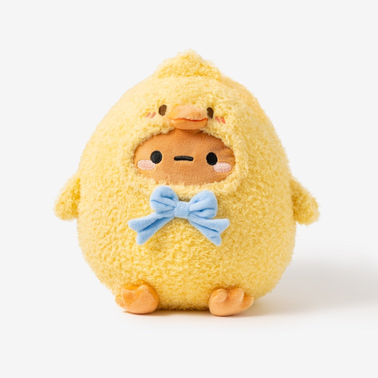 Yellow plush toy with a blue bow tie on a white background