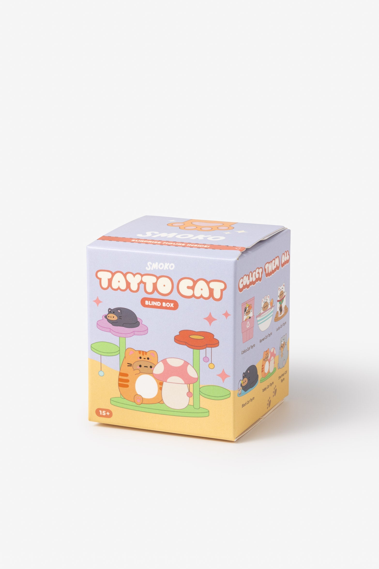 Product shot of a "Smoko Tayto Cat Blind Box". The box is light blue with orange font and imagery of cats. One side of the box lists "Calico Cat Tayto", "Ramen Cat Toyto", "Lucky Cat Toyto", "Black Cat Tayto", "Tobby Cat Toyto", and "Shorthair Cat Toyto" while the front of the box has an age rating of "15+".