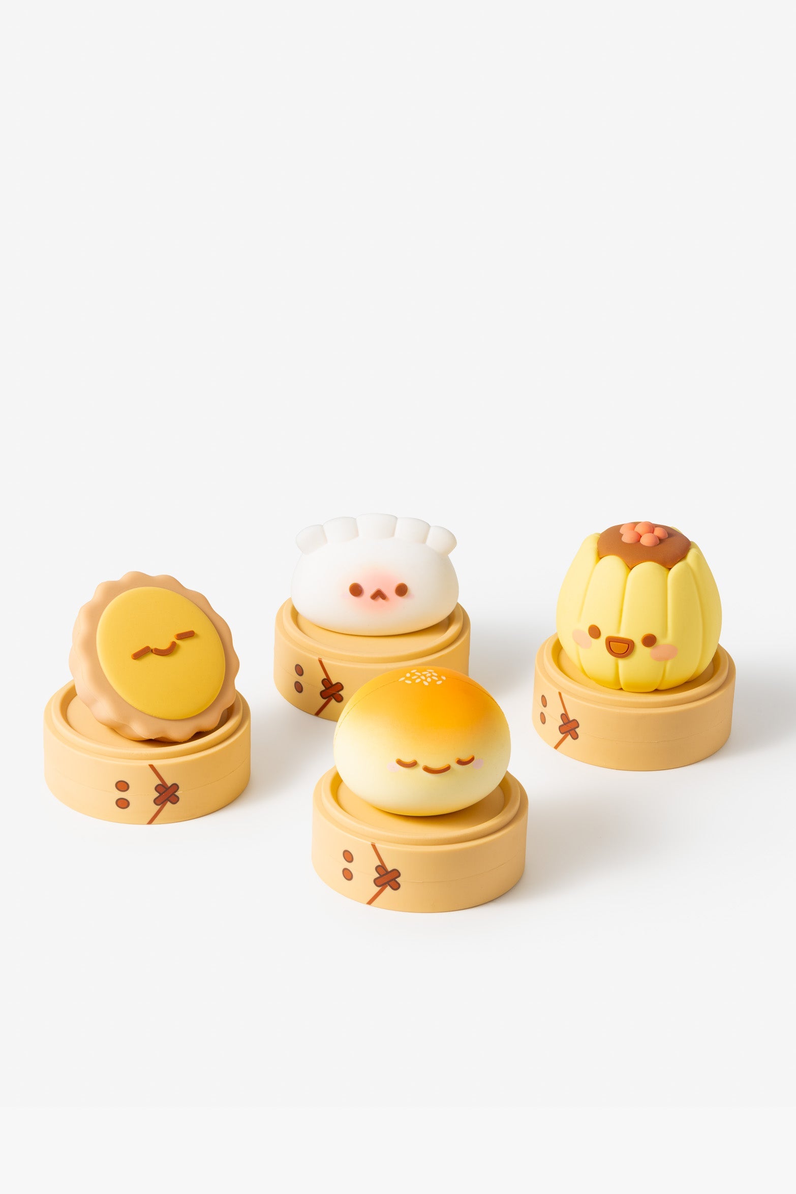 Four kawaii food-themed toys arranged in a row.