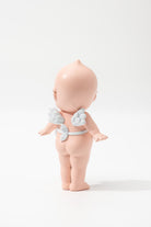 Back photo of baby figure with angel wings