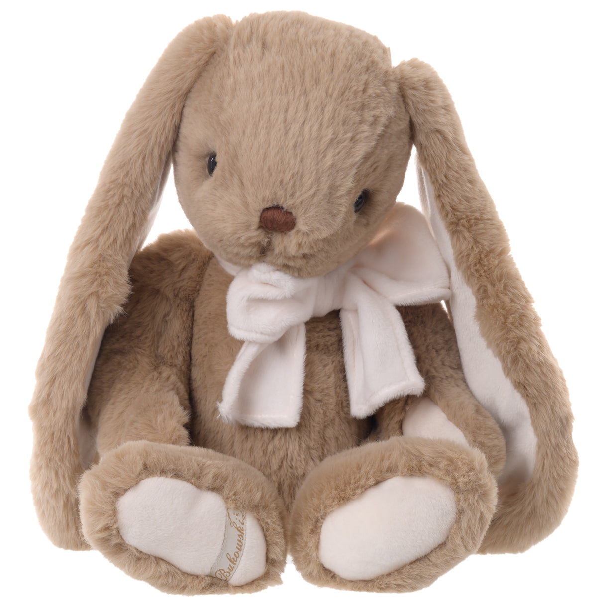 Plush toy rabbit with a white bow on a white background