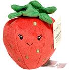Plush strawberry toy with a smiley face and green leaves on a white background