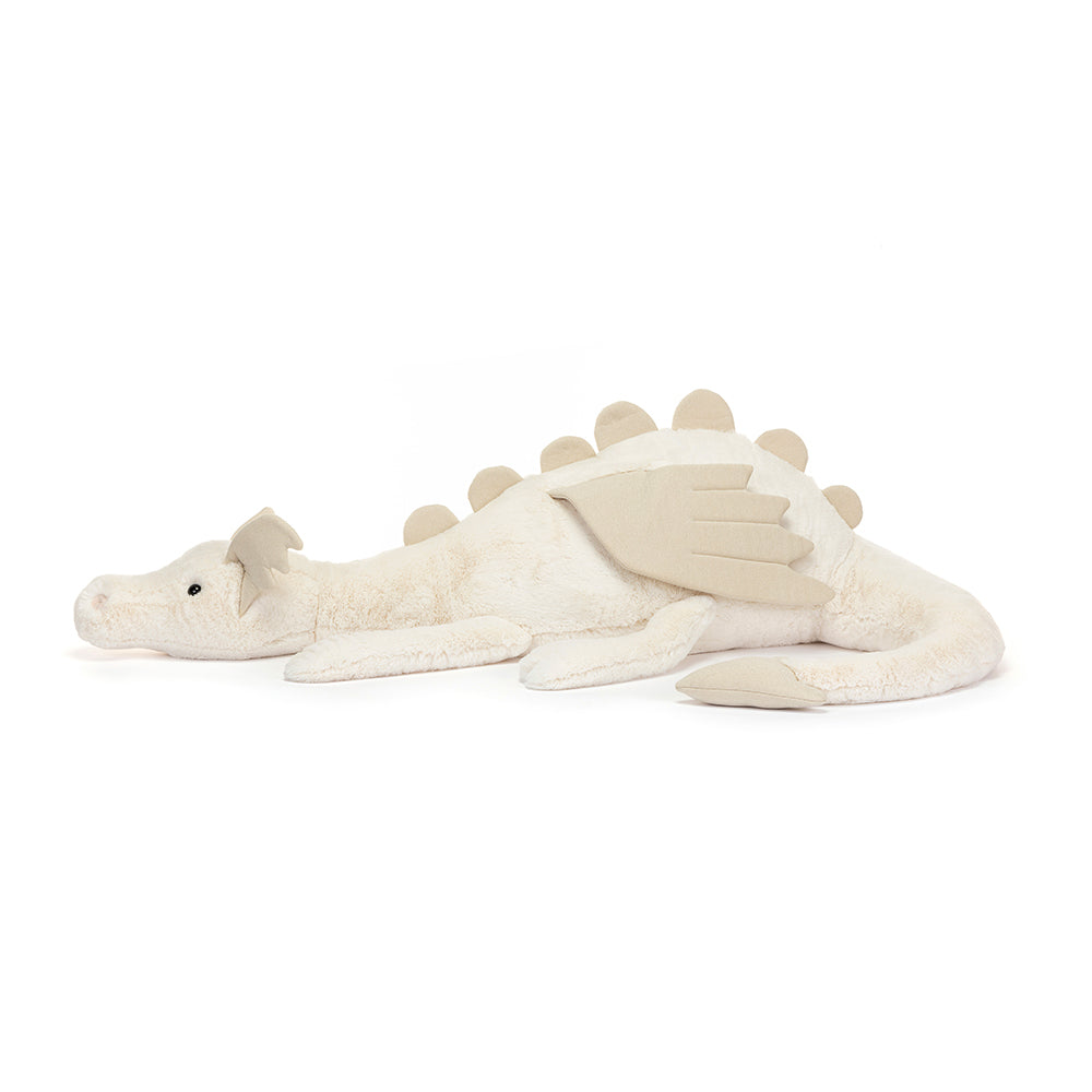Stuffed, plush, ivory-colored dragon with tan wings.