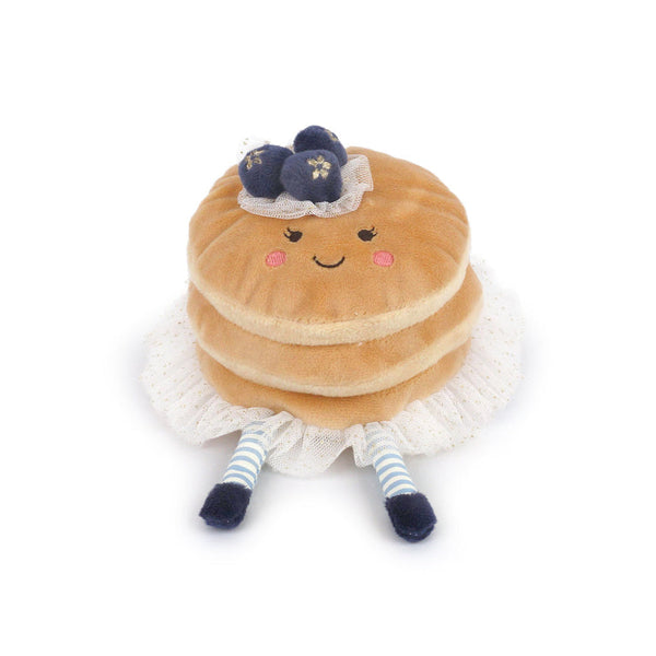 Stuffed stack of pancakes with blueberries, white lace trim, and blue and white striped legs.