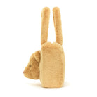 Tan furry teddy bear purse with handles.