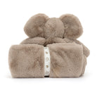 Gray stuffed elephant toy with blanket.