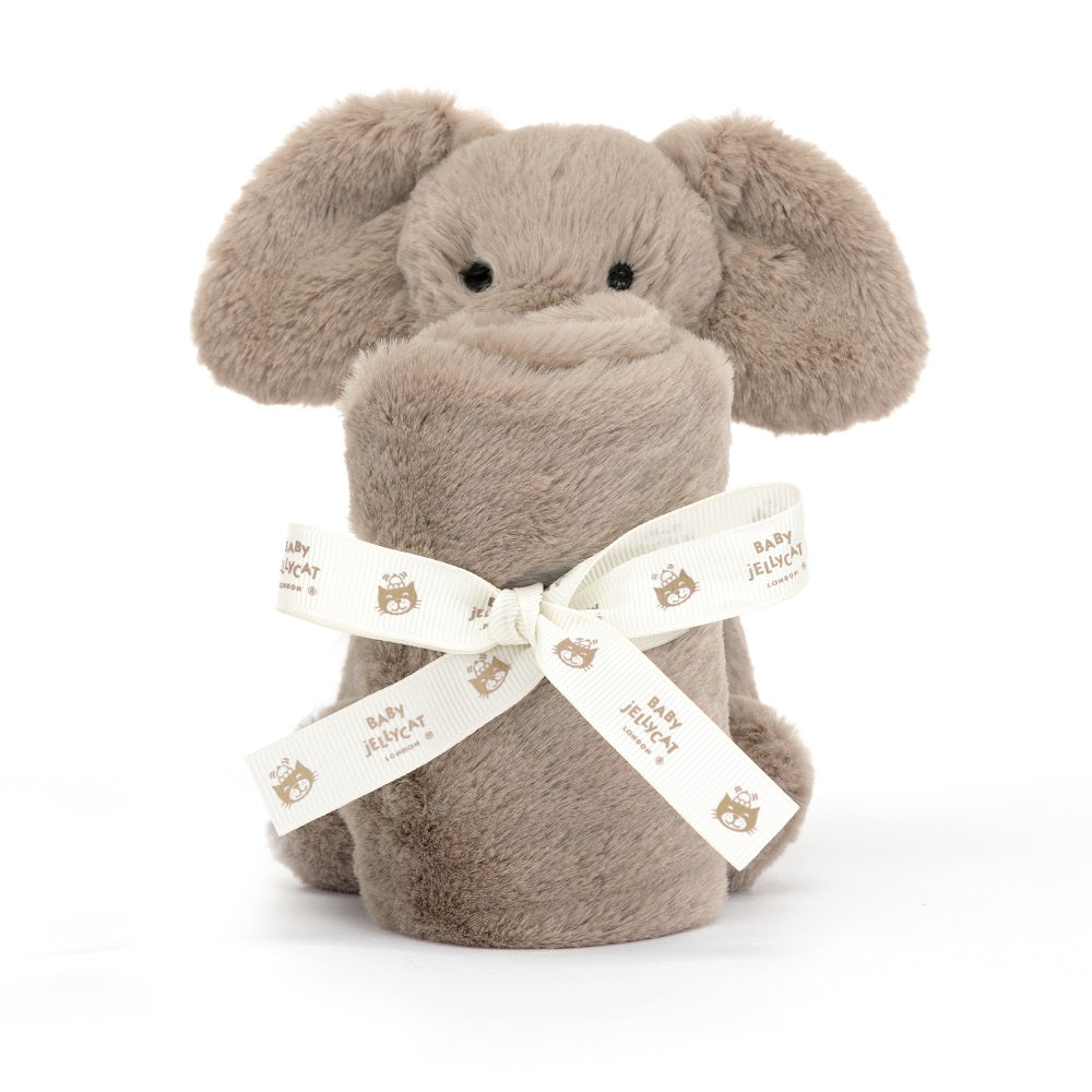 Stuffed gray elephant toy wrapped with ribbon.
