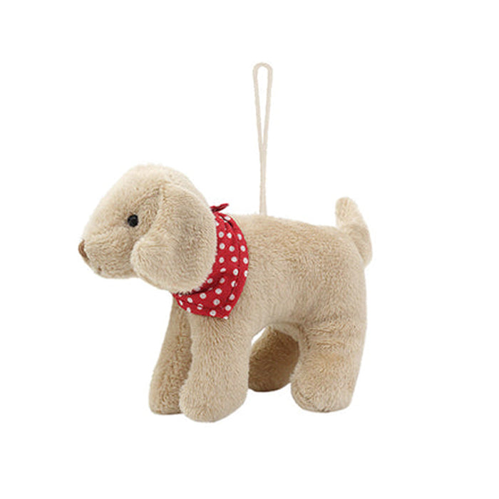 Stuffed tan dog with red polka dot bandana and hanging loop.