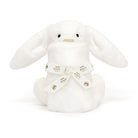 White plush bunny tied with "Baby Jellycat" ribbon.