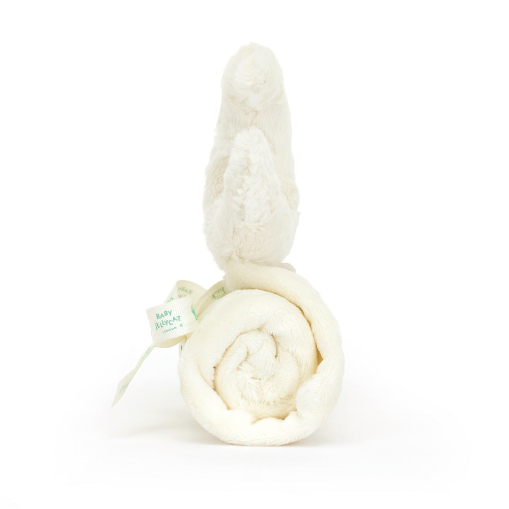 Rolled-up white baby blanket with bunny ears sticking out and a "Baby Jellycat" tag.