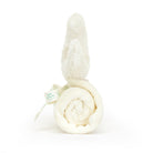 Rolled-up white baby blanket with bunny ears sticking out and a "Baby Jellycat" tag.