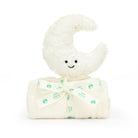 Close-up of a plush, cream-colored crescent moon toy with a cute, smiling face, sitting atop a rolled-up cream-colored baby blanket tied with a matching ribbon decorated with a baby owl logo.