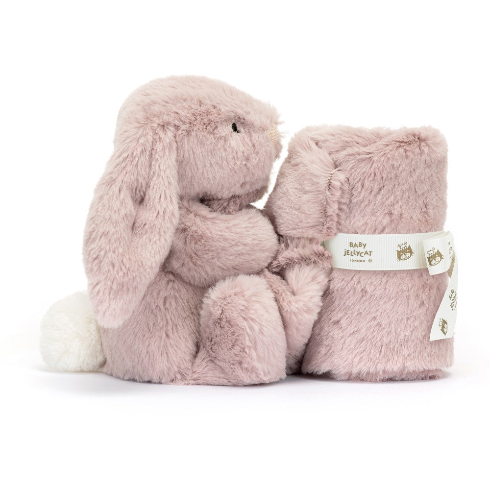 A plush bunny and blanket set in mauve color.