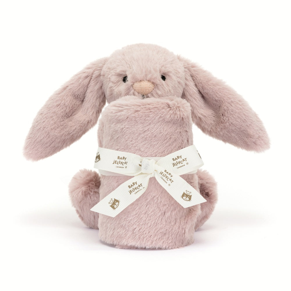 Pink stuffed bunny with a ribbon.