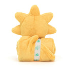 Yellow plush sun toy with a blanket wrapped around it, secured with a white Baby Jellycat ribbon.