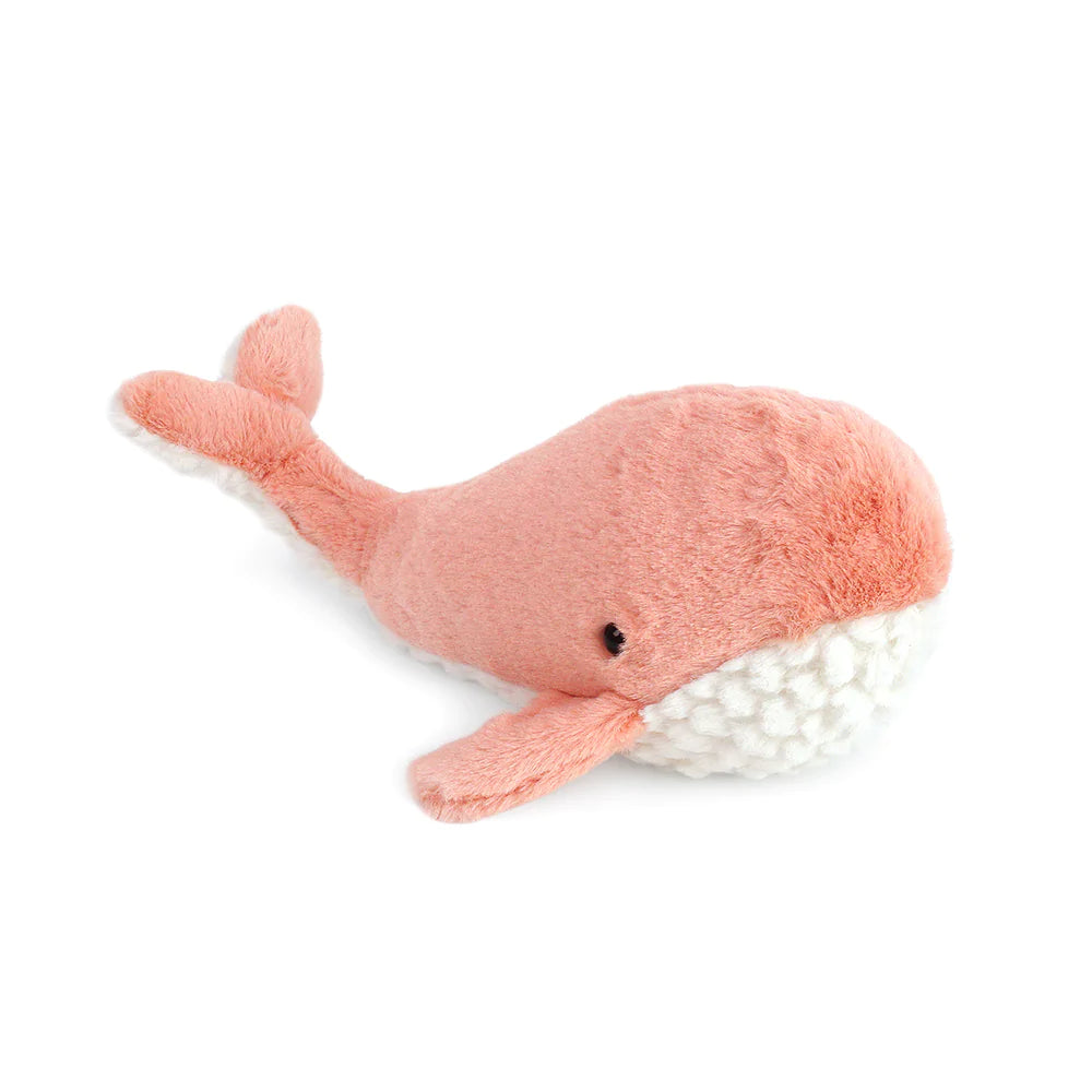 Stuffed pink whale toy with white underside.