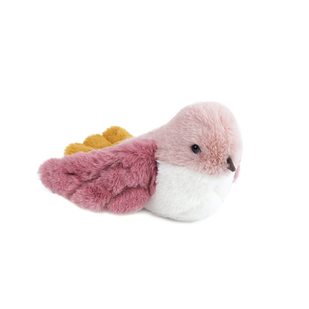Stuffed pink and white plush bird with yellow accents.
