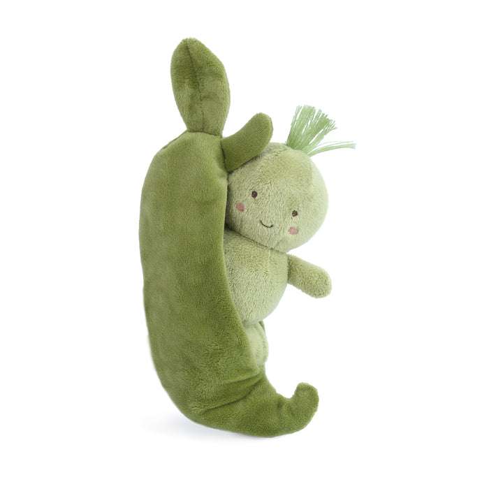 A green, plush toy pea inside a pea pod.