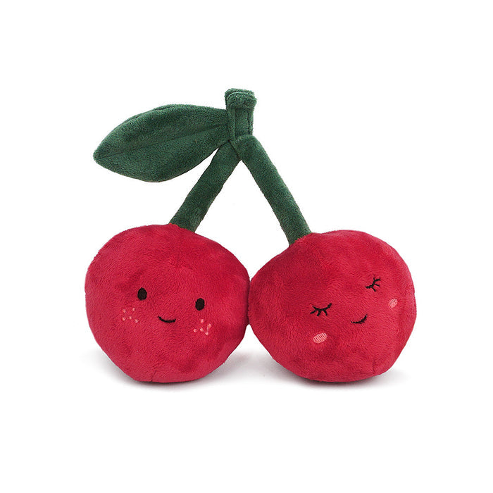 Two plush cherries with smiling faces, connected by green stems and a single green leaf.