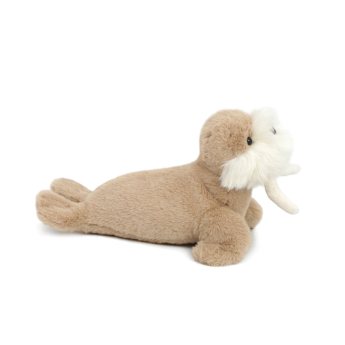 Tan plush walrus with white whiskers and tusks.