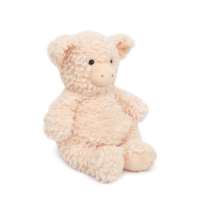 Stuffed pig toy with tan fur sitting on a white background.