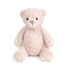 Pink teddy bear sitting.