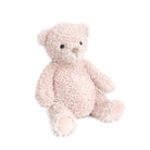 Pink teddy bear sitting. Fluffy, plush toy.