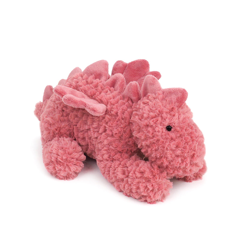 Pink stuffed dragon.