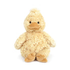 Stuffed yellow duck with fuzzy fabric and brown beak and feet.