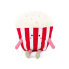 Stuffed popcorn plush toy with red and white stripes, smiley face, and striped limbs.