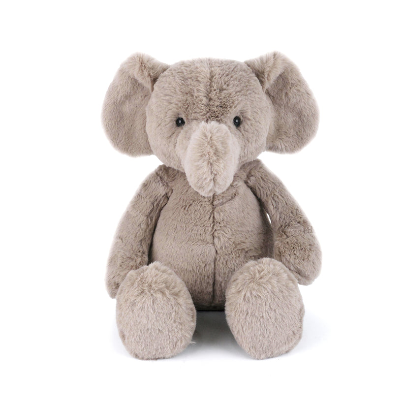 Stuffed, gray elephant sitting upright.