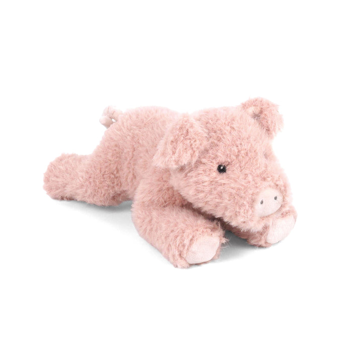 Pink plush pig toy on a white background