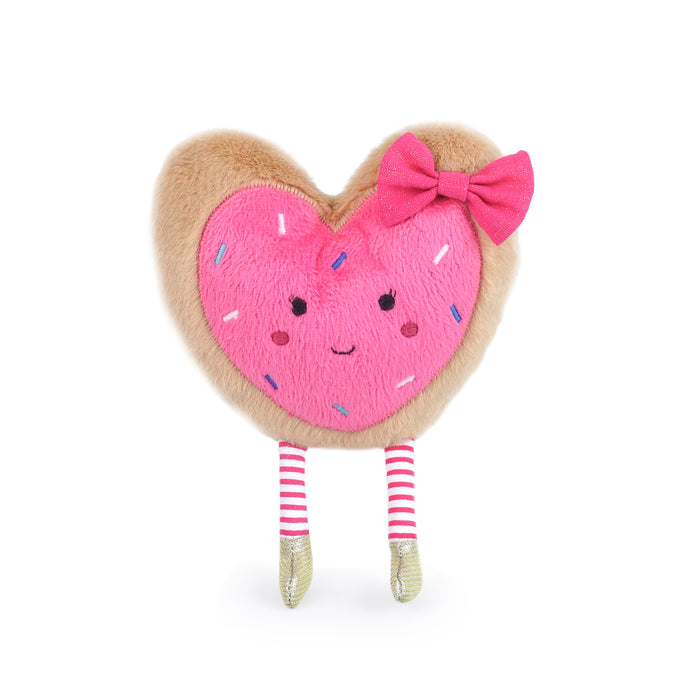 Heart-shaped plush toy with a pink face, bow, and striped legs on a white background