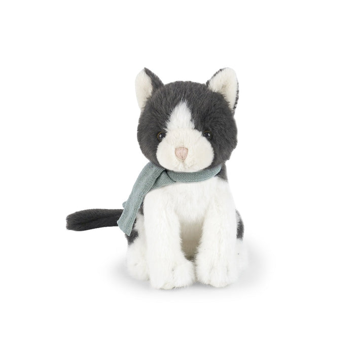 Plush toy cat with a green scarf on a white background