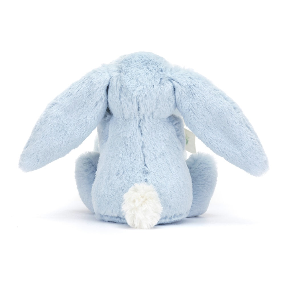 Back of a light blue plush bunny with a white tail.