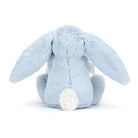 Back of a light blue plush bunny with a white tail.